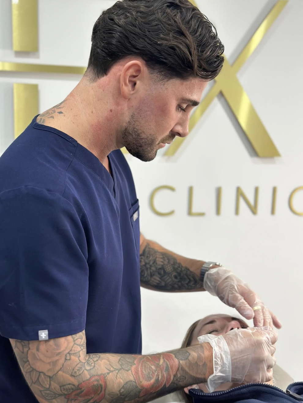 Nurse Sean performing treatment